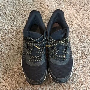 Under Armour Black and Gold Athletic Shoes Curry